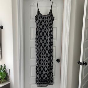 Beautiful beaded full length spaghetti strap formal.